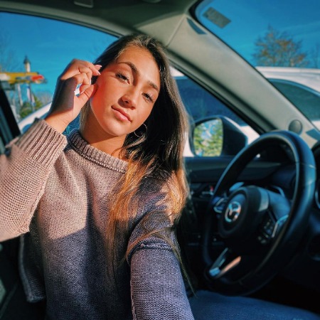 Jenna Sinatra inside her Mazda car.